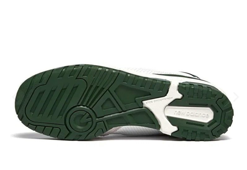 Green and white sneaker sole on a white background