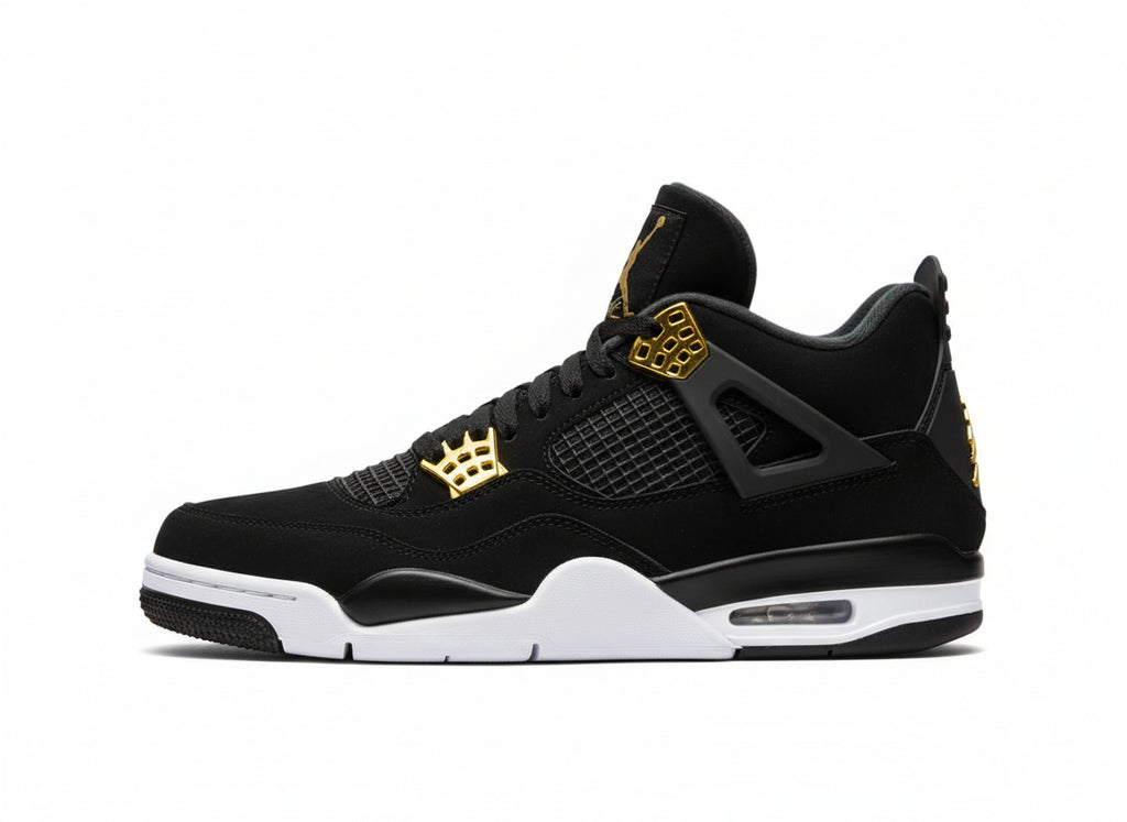 Black and gold sneaker with white sole on a gray surface